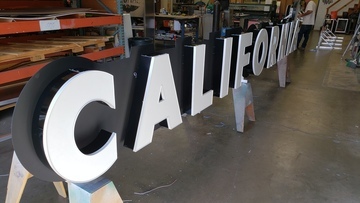 Covered California Sign
